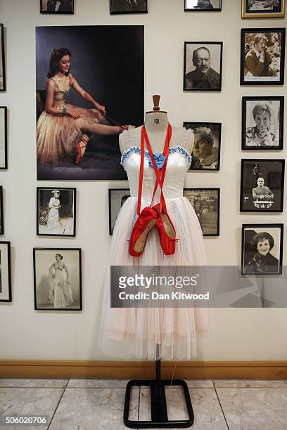 The outfit worn by Moira Shearer in the film Red Shoes is displayed near actors' headshots and movie stills at Angels Costume House on January 20,...