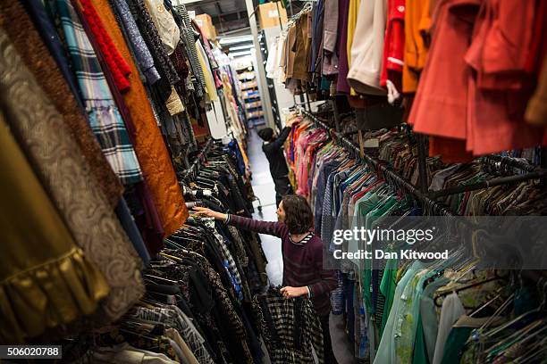 Customers search for items in the stockroom at Angels Costume House on January 20, 2016 in London, England. Angels Costumes established in 1840 is in...