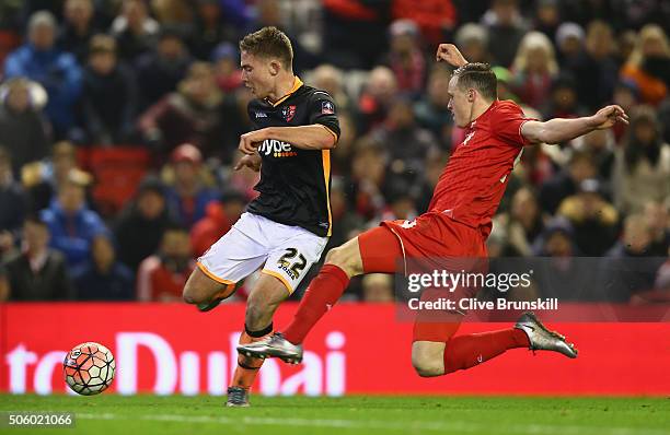 David Wheeler of Exeter City in action with Brad Smith of Liverpool during The Emirates FA Cup Third Round Replay match between Liverpool and Exeter...