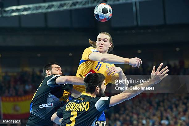 Lukas Nilsson of Sweden and Eduardo Gurbindo of Spain during the C group match of the EHF European Men's Handball Championship between Spain and...