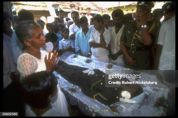 Family mourning at mil. Funeral of only son, Lance Corporal Alvis, killed by LTTE rebels in Jaffna OP Leap Forward govt. Offensive on Tamil Tigers.