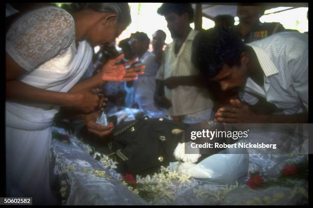 Family mourning at mil. Funeral of only son, Lance Corporal Alvis, killed by LTTE rebels in Jaffna OP Leap Forward govt. Offensive on Tamil Tigers.