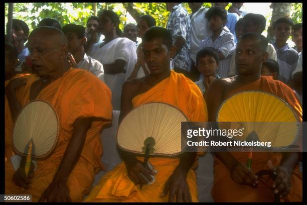 Buddhist monks during mil. Funeral for Lance Corporal Alvis, killed by LTTE rebels in Jaffna OP Leap Forward govt. Offensive on Tamil Tigers.