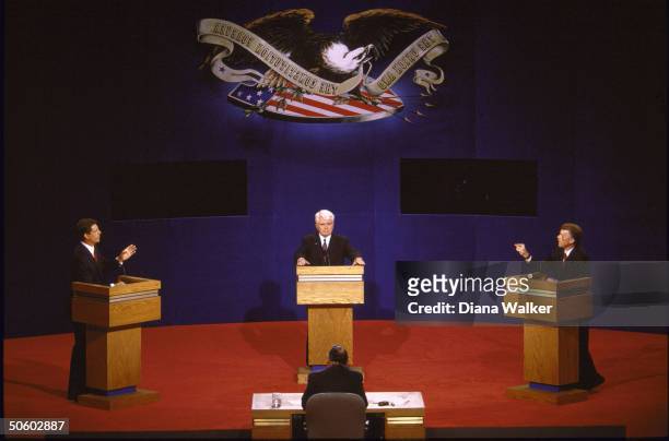 Vice presidential campaign debate: Republican Dan Quayle, Independent James Stockdale, & Democrat Al Gore facing moderator in TV debate.