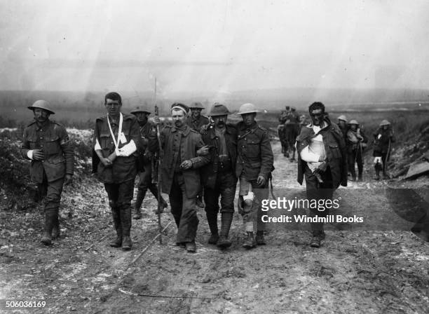 Battle of Bazentin Ridge. British and German wounded on their way to the Dressing Station near Bernafay Wood, 19th July, 1916. British Front - France...