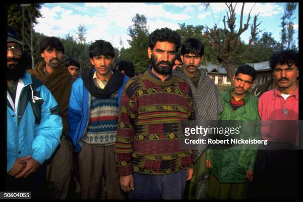 Kashmiri men, once pro-Pakistan militants who surrendered to Indian Army, now used by latter to fight other militant groups, in civilian garb at army...