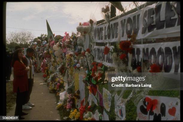 Crowd of fans paying tribute to Tejano singer Selena, who was shot to death by her former fan club pres. Yolanda Saldivar, outside Selena's family...