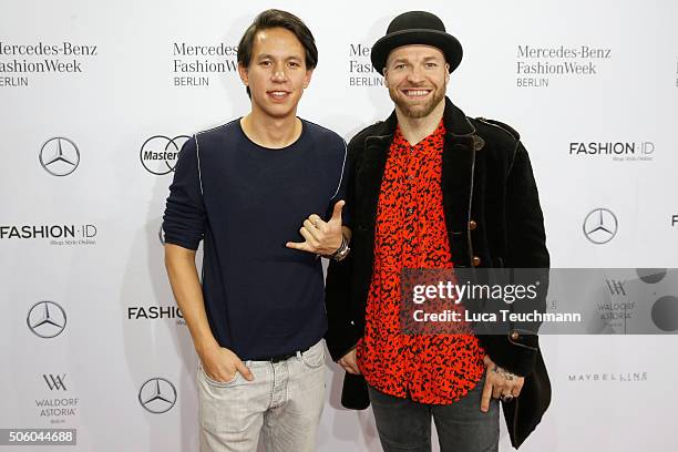 Chino and Mateo Jaschik attend the Dimitri show during the Mercedes-Benz Fashion Week Berlin Autumn/Winter 2016 at Brandenburg Gate on January 21,...