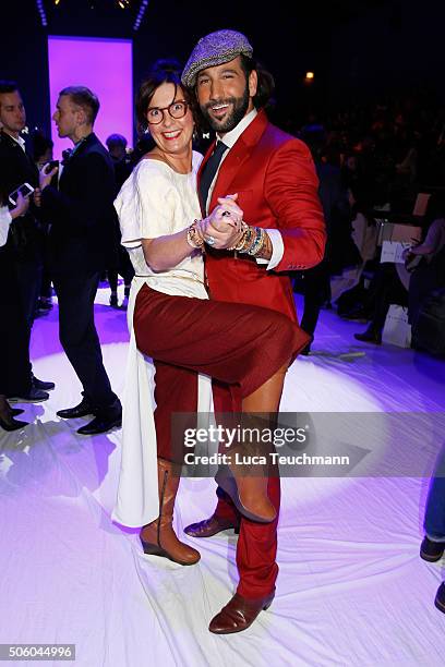 Astrid Rudolph and Massimo Sinato attend the Dimitri show during the Mercedes-Benz Fashion Week Berlin Autumn/Winter 2016 at Brandenburg Gate on...