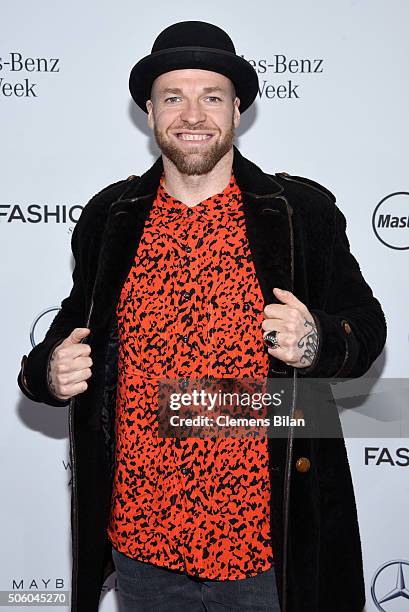 Mateo Jaschik of Culcha Candela attends the Dimitri show during the Mercedes-Benz Fashion Week Berlin Autumn/Winter 2016 at Brandenburg Gate on...