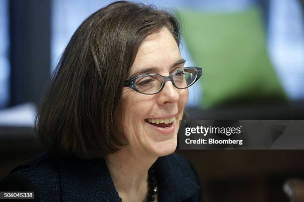 Kate Brown, governor of Oregon, smiles during an interview in Portland, Oregon, U.S. On Wednesday, Jan. 20, 2016. Brown, a Democrat, joined the state...