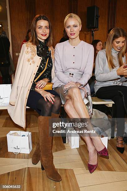 Eva Padberg and Franziska Knuppe attend the Marina Hoermanseder show as part of Der Berliner Mode Salon during the Mercedes-Benz Fashion Week Berlin...