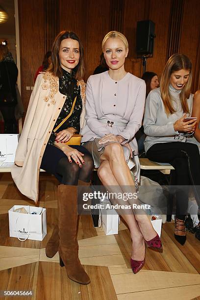 Eva Padberg and Franziska Knuppe attend the Marina Hoermanseder show as part of Der Berliner Mode Salon during the Mercedes-Benz Fashion Week Berlin...