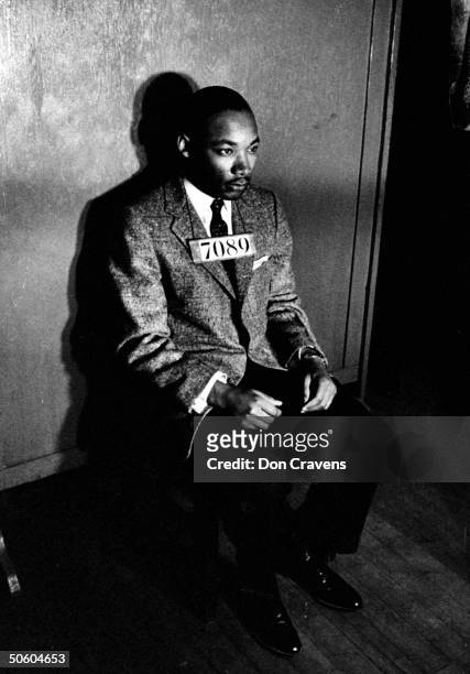 American civil rights leader, Rev. Martin Luther King Jr. Wearing a 7089 sign across his chest for a mug shot at a police station house in Montgomery...