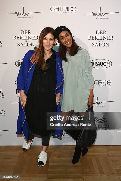 Hadnet Tesfai and guest attend the Marina Hoermanseder show as part of Der Berliner Mode Salon during the Mercedes-Benz Fashion Week Berlin...