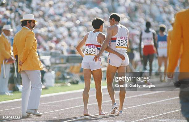 Silver medalist Sebastian Seb Coe and Steve Ovett of Great Britain embrace on the track after the final of the Men's 800 metres event at the 1984...