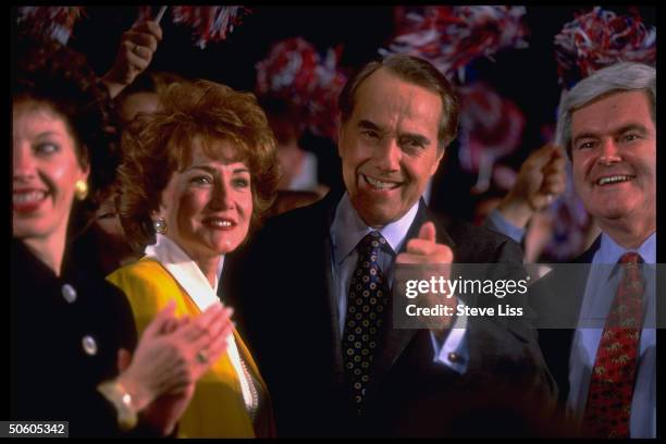 Elizabeth Dole, 1996 GOP presidential contender Sen. Maj. Ldr. Bob Dole, an House Speaker Newt Gingrich celebrating Dole's victories in the Super...