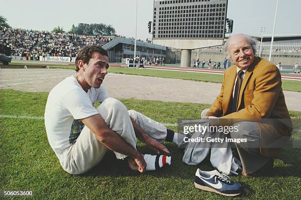 Steve Ovett with coach Harry Wilson after the 1980 Golden Mile at Crystal Palace on August 25, 1980 in London, England.