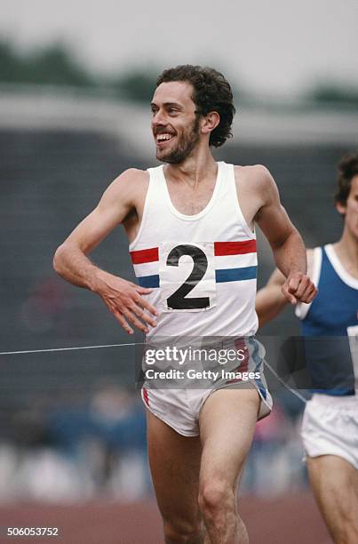 Steve Ovett smiles as he crosses the line to win a 1500 metres race in a meeting against East Germany at Crystal Palace on June 10, 1978 in London,...