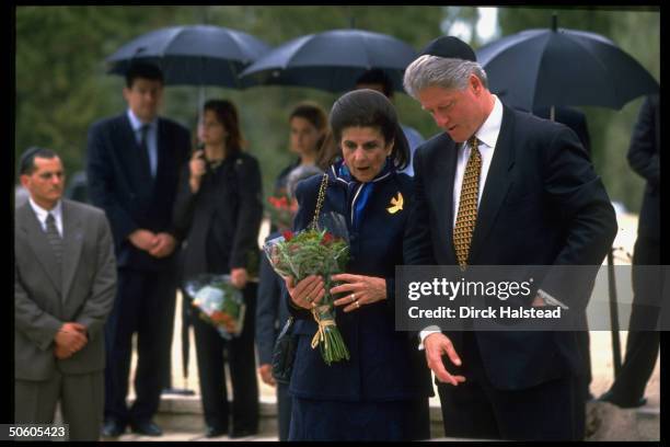 Pres. Bill Clinton w. Yitzhak Rabin's widow Leah, visiting slain PM's grave, paying respects while visiting re terror & peace.