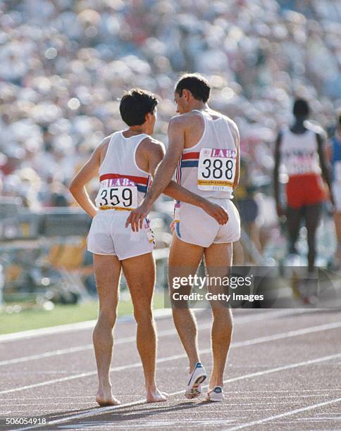 Silver medalist Sebastian Coe and Steve Ovett of Great Britain embrace on the track after the final of the Men's 800 metres event on 6th August 1984...