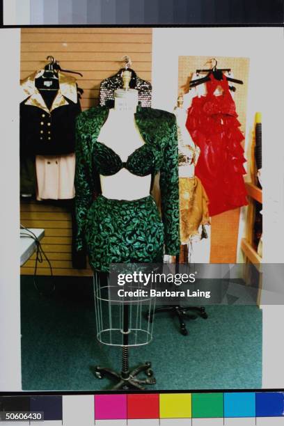 Crushed velvet green floral halter top, bolero jacket & miniskirt on dressmaker's dummy which was worn by late tejano singer Selena who was killed by...