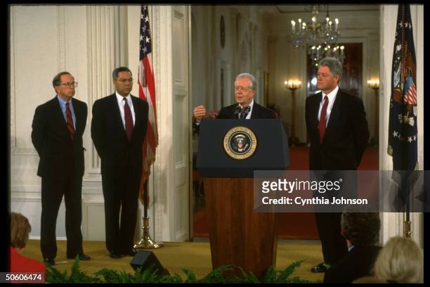 Sen. Nunn, Gen. Powell, ex-Pres. Carter & Pres. Clinton at WH news conf. On trio's trip to Haiti re reinstating ousted Aristide govt. W/o US invasion.