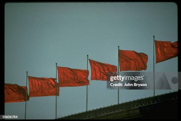 Chinese flags flying over Great Hall of People.