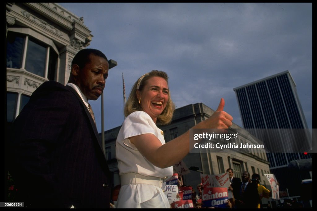 Rodham Hillary Rodham Clinton profers a thumbs-up at a rally during her ...