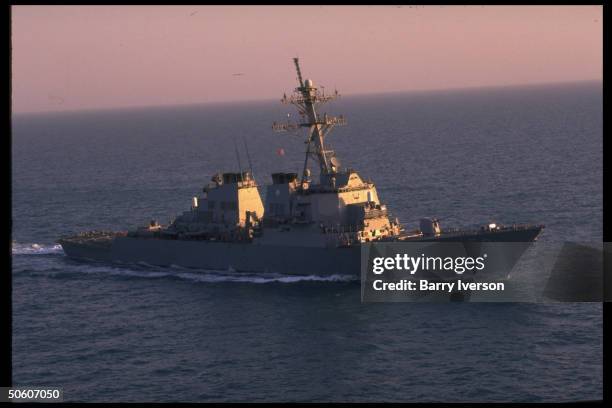 Aegis class destroyer USS Russell cruising Persian Gulf waters, enforcing no-fly zone & other restrictions against Iraq.