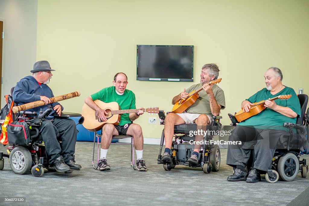 Men in Wheelchairs Playing Music