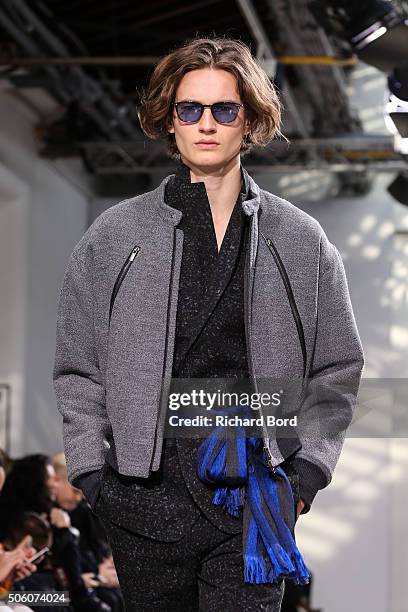 Model walks the runway during the Issey Miyake Men Menswear Fall/Winter 2016-2017 show as part of Paris Fashion Week on January 21, 2016 in Paris,...