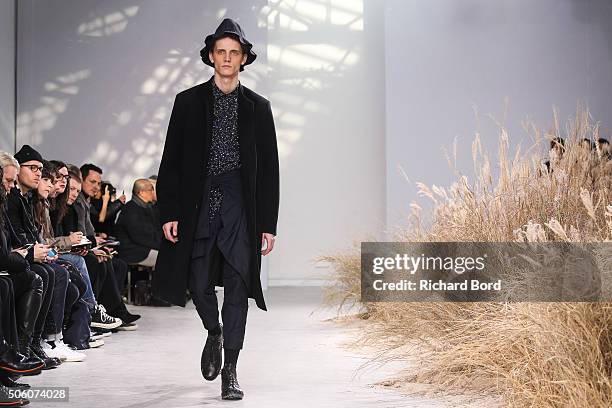 Model walks the runway during the Issey Miyake Men Menswear Fall/Winter 2016-2017 show as part of Paris Fashion Week on January 21, 2016 in Paris,...