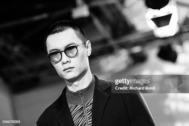 Model walks the runway during the Issey Miyake Men Menswear Fall/Winter 2016-2017 show as part of Paris Fashion Week on January 21, 2016 in Paris,...