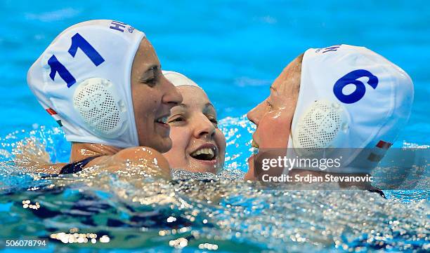 Dora Csabai Ildiko Toth and Orsolya Takacs of Hungary celebrate victory after the Women's Semifinal match between Italy and Hungary at the Waterpolo...