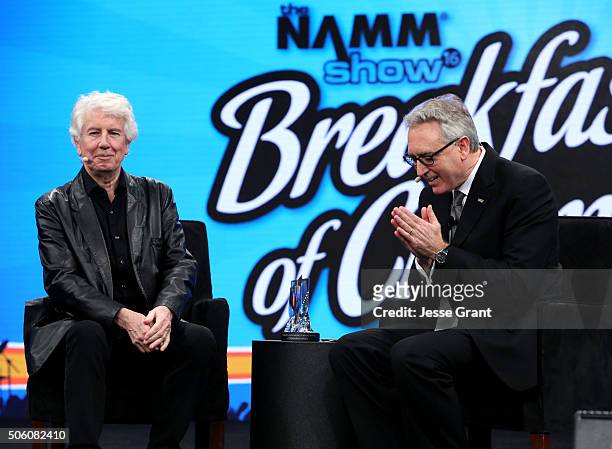 Namm President and CEO Joe Lamond and Singer Songwriter Graham Nash speak on stage at the 2016 NAMM Show Opening Day at the Anaheim Convention Center...