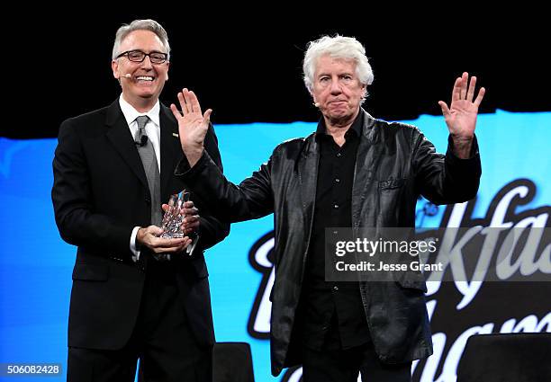 Namm President and CEO Joe Lamond and Singer Songwriter Graham Nash speak on stage at the 2016 NAMM Show Opening Day at the Anaheim Convention Center...