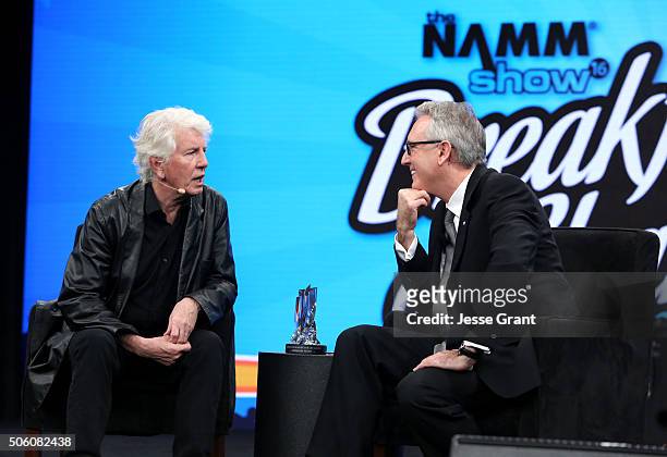 Namm President and CEO Joe Lamond and Singer Songwriter Graham Nash speak on stage at the 2016 NAMM Show Opening Day at the Hilton Anaheim on January...
