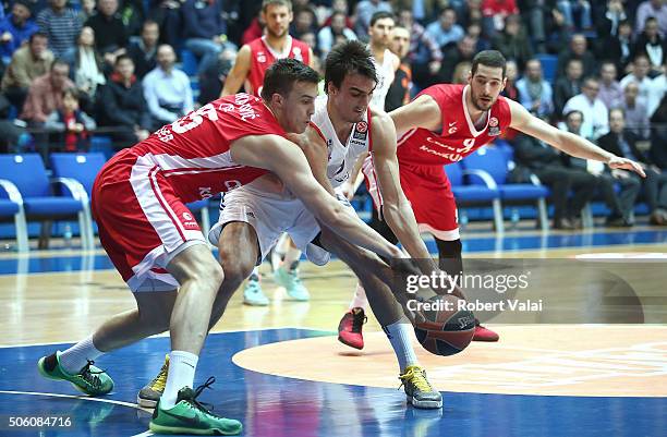 Marko Arapovic, #35 of Cedevita Zagreb competes with Dario Saric, #9 of Anadolu Efes Istanbul during the Turkish Airlines Euroleague Basketball Top...