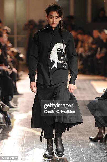 Model walks the runway at the Yohji Yamamoto Autumn Winter 2016 fashion show during Paris Menswear Fashion Week on January 21, 2016 in Paris, France.