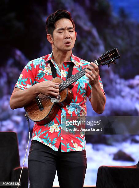 Composer Jake Shimabukuro performs on stage at at the 2016 NAMM Show Opening Day at the Hilton Anaheim on January 21, 2016 in Anaheim, California.