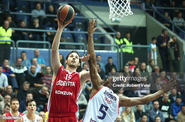 Miro Bilan, #15 of Cedevita Zagreb competes with Derrick Brown, #5 of Anadolu Efes Istanbul during the Turkish Airlines Euroleague Basketball Top 16...