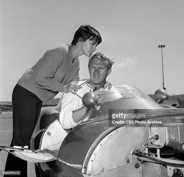 American actor, Steve McQueen and his wife, Neile Adams with his 1959 Lotus Eleven racing car at Del Mar raceway, San Diego, California. Image dated...