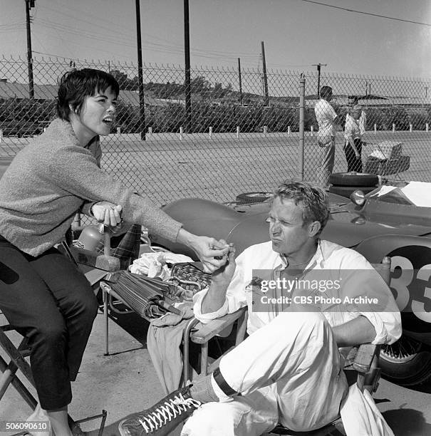 American actor, Steve McQueen and his wife, Neile Adams with his 1959 Lotus Eleven racing car at Del Mar raceway, San Diego, California. Image dated...