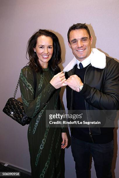 New Zealand Rugby Player and Champion of the World with "All Blacks", Dan Carter and his wife Honor Carter, dressed in Louis vuitton, pose Backstage...