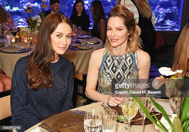 Olga Kurylenko and Sienna Guillory attend a private dinner hosted by Creme de la Mer to celebrate the launch of Genaissance de la Mer the Serum...