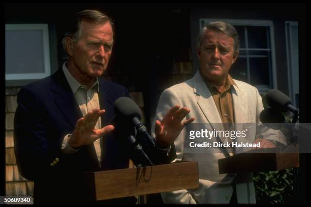 Pres. Bush & Canadian PM Brian Mulroney at twin podiums, outside Bush home, holding news conf. After gulf crisis mtg.