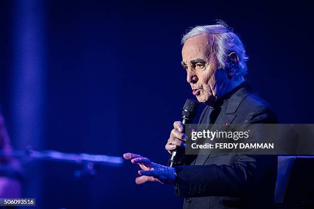 French-Armenian singer Charles Aznavour performs at the Heineken Music Hall in Amsterdam on January 21 during his farewell tour. / AFP / ANP / FERDY...