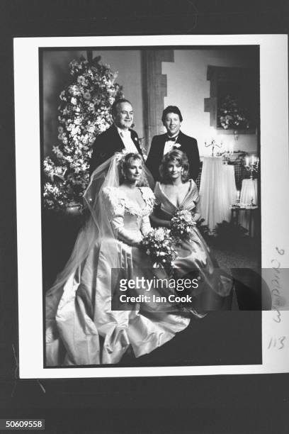 Actress Deidre Hall wearing gorgeous wedding dress designed by Nolan Miller posing w. Her new husband TV producer Steven Sohmer , his unident. Best...