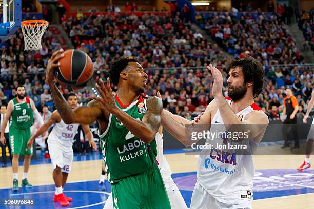 Darius Adams, #20 of Laboral Kutxa Vitoria Gasteiz competes with Milos Teodosic, #4 of CSKA Moscow during the Turkish Airlines Euroleague Basketball...